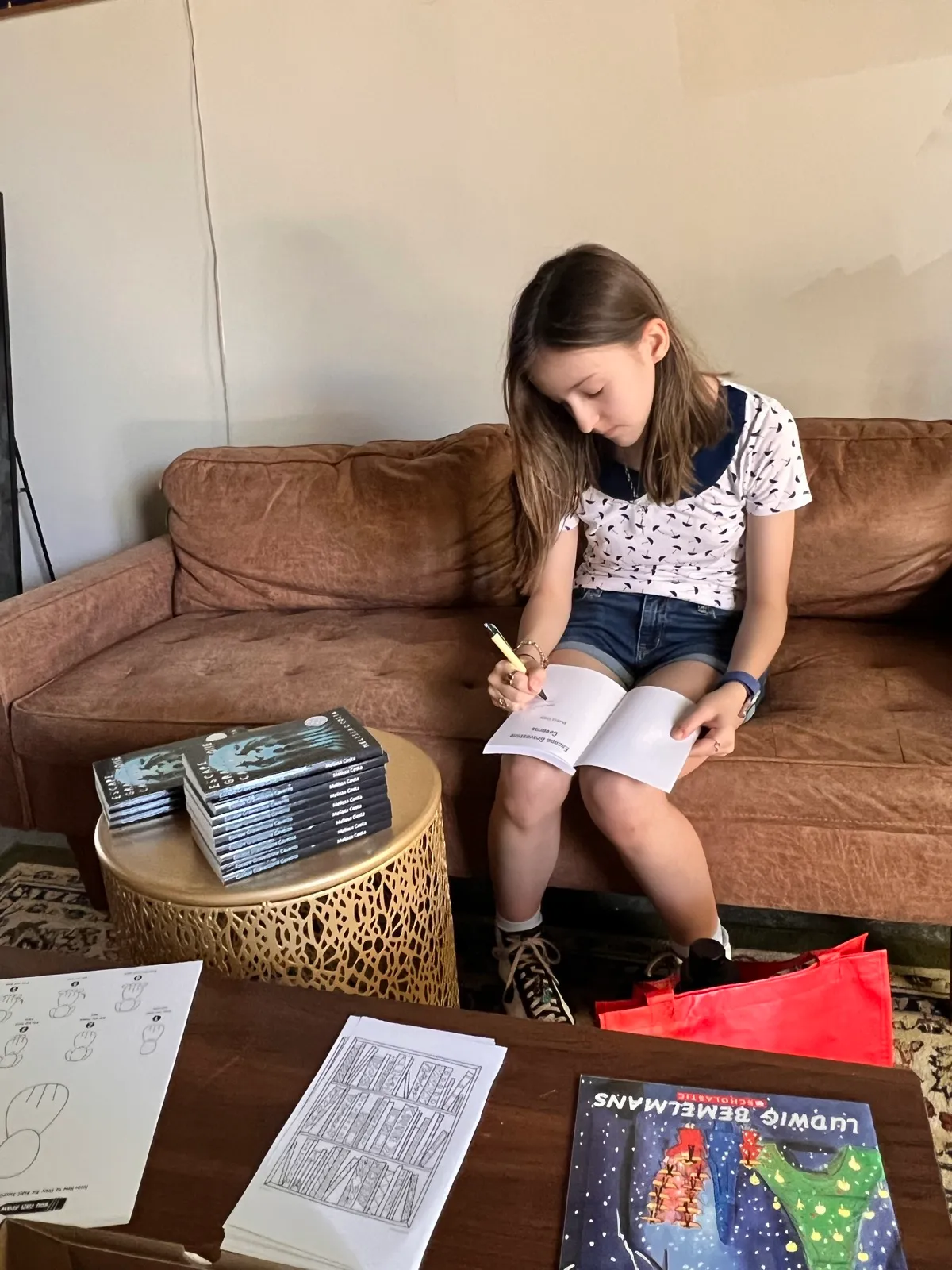Melissa signing all books